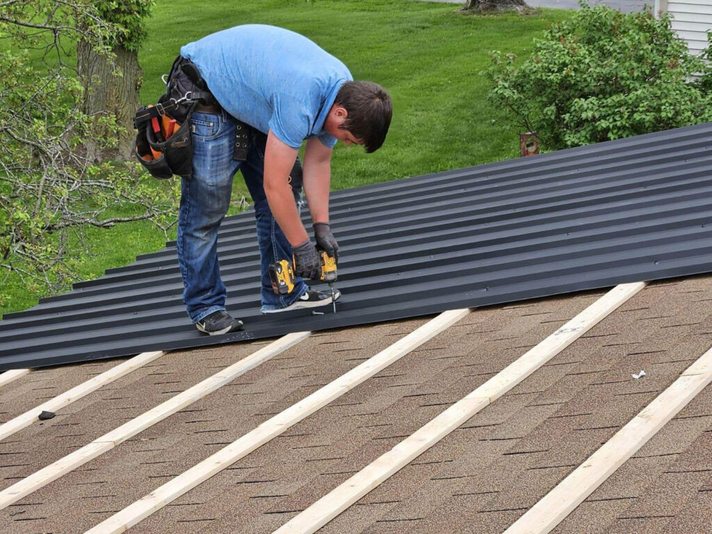 Allied employee helping with roof replacement